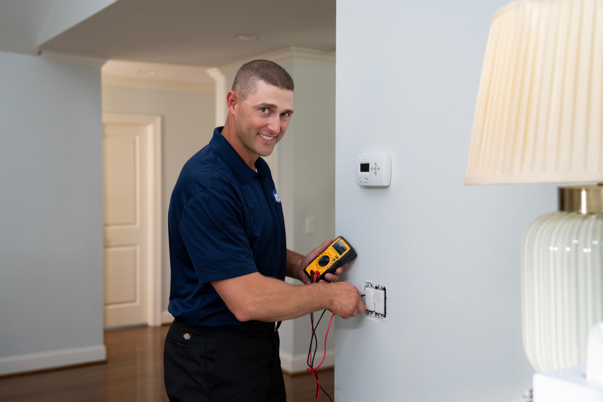 residential electrician testing socket